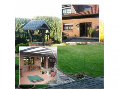 Traumwohnung mit einer wunderschönen Gartenoase, überdachter Terrasse, Kaminofen und vielem mehr...!