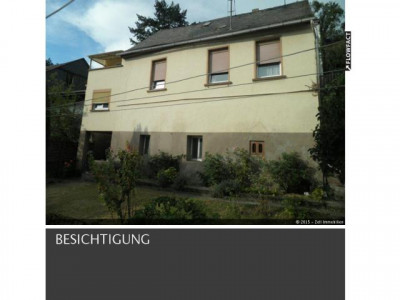 Einfamilienhaus mit Garten und Doppelgarage