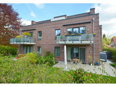 Neuwertige 3-Zimmer-Wohnung mit Gartenanteil in Villenlage